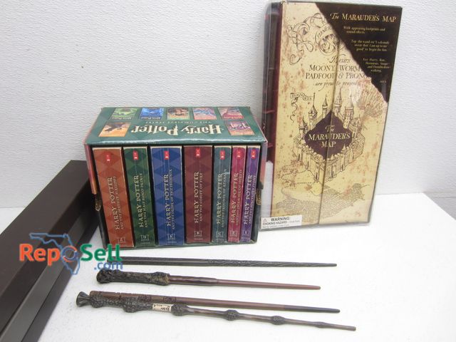 Lot 31-1424 - Lot of Harry Potter Collectibles: Wands, books etc