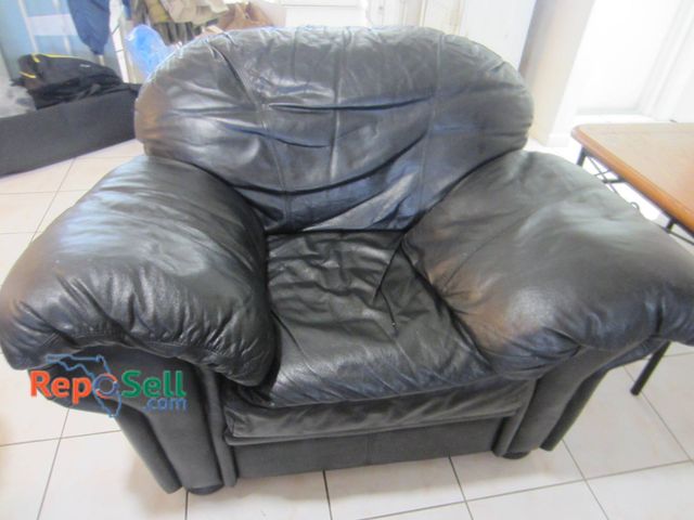 Lot 31-8659 - Black Pleather Armchair 50"x30"x41" With Overstuffed Cushions