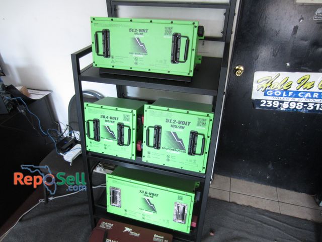 Lot 31-1187 - Bolt Energy Dislplay with 5 Battery Housings including one Trojan Housing