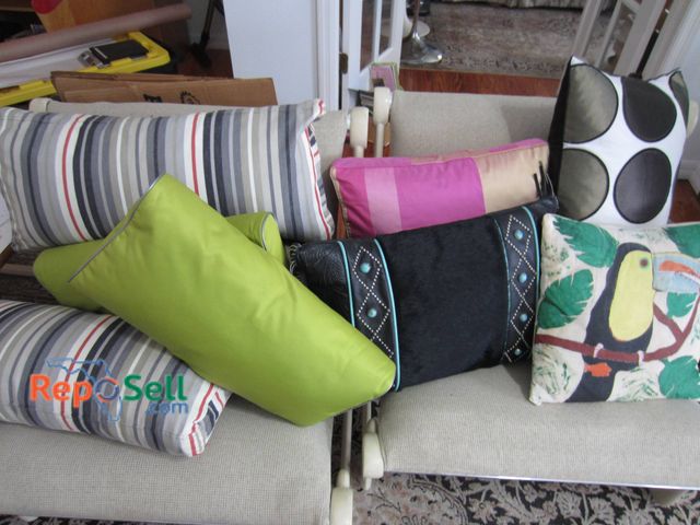 Lot 31-9224 - (8) Decorative throw pillows, including striped, solid-colored, and patterned styles.