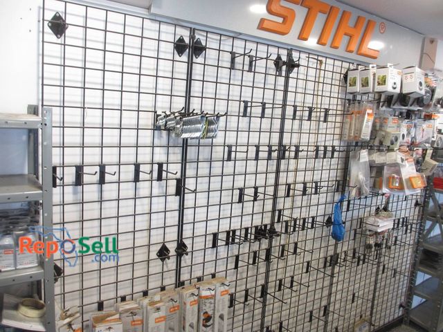 Lot 31-1330 - (5) Pieces Of 7ft X 24in Gridwall With Various Attachments. No Contents Are Included. Metal Construc...