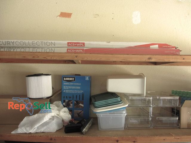 Lot 31-8593 - Storage Drawers, Cleaning Kit, Vacuum Filters & Attachments, And Laminate Flooring
