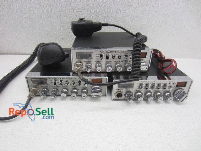 Lot 31-8120 - (3) Cobra Radios w/(2) Walkies