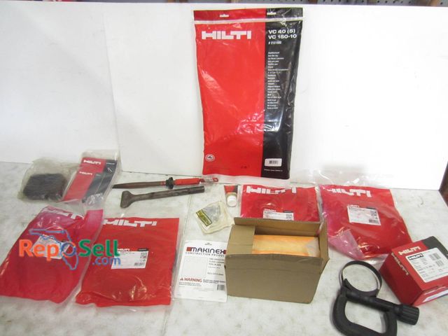Lot 31-1253 - Hilti Parts And Accessories Including Supply Cords, Chisels, Handles, And Plastic Bags. Items Appear...
