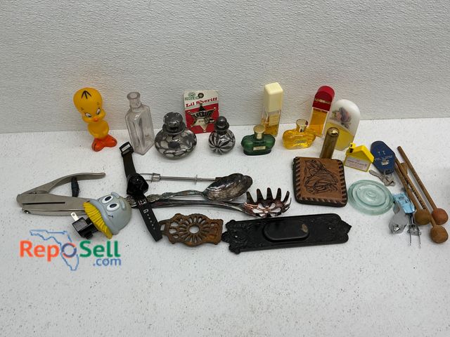 Lot 31-1418 - An assortment of vintage perfume bottles, including high-end perfume brands, alongside various misce...