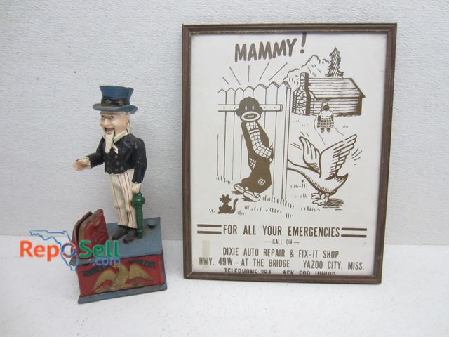 Lot 31-9165 - Vintage Cast Iron "Uncle Sam" Bank And "Mammy" Poster