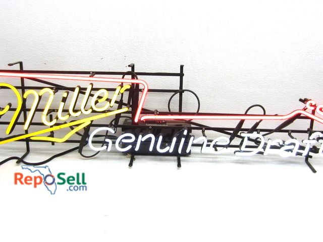 Lot 31-5391 - Miller Genuine Draft Neon Guitar Sign - Powers On/Lights - In original shipping box