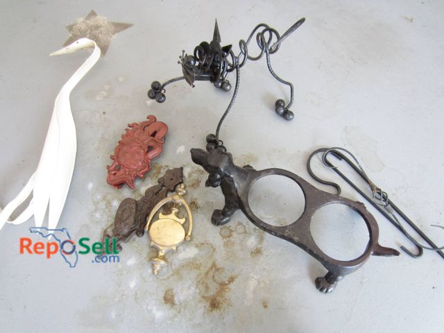 Lot 31-9211 - Lot containing decorative metal objects, including a white painted metal bird figurine, a wrought ir...
