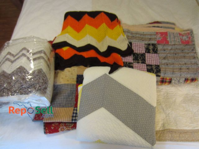 Lot 31-9045 - (5) Patchwork Quilts And Chevron Knit Blankets; Assorted Sizes And Materials.