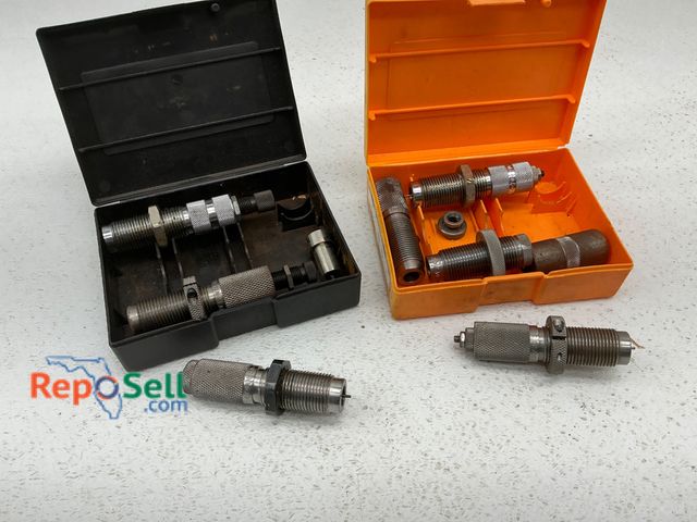 Lot 31-1454 - Two reloading die sets for 30-30 Winchester, including a set by Lyman black plastic case and a set b...