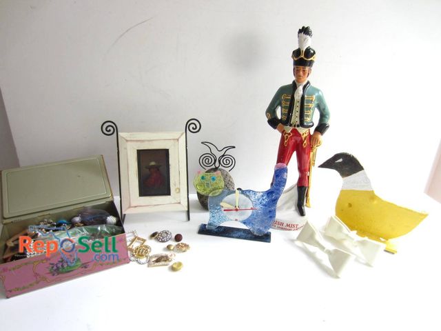 Lot 31-9307 - A varied group of decorative items, including an Irish Mist figurine of a uniformed man, a painted w...