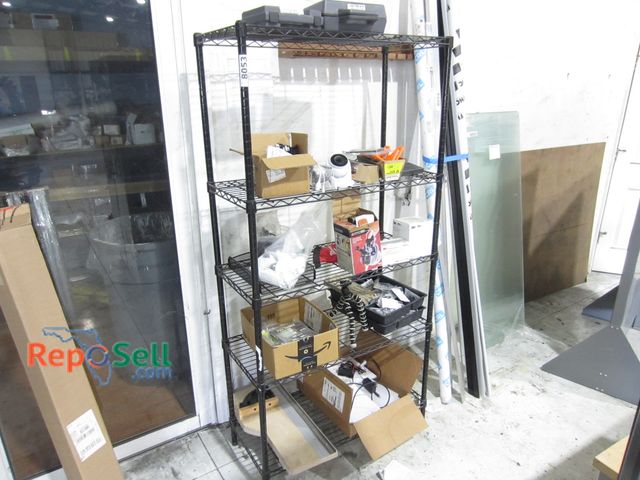Lot 31-8053 - Storage Rack with Contents: Grizzly Table saw parts, CCTV Camera, Tools etc.  74" H x 36" W x 18" D ...