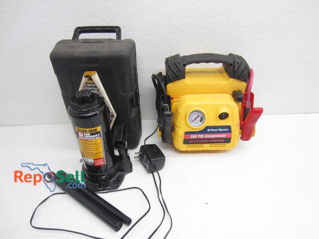 Lot 31-6106 - 6-Ton Jack (Appears Unused) And Jump Starter -Power On, No Further Testing