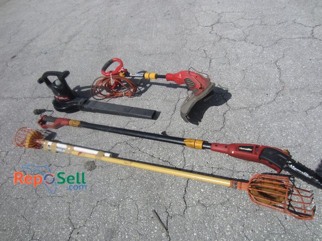Lot 31-7088 - Yard Tools: (2) Homelite Tools: Telescoping Electric 8" Pole Saw &amp; Elec. 15" Telescoping String ...