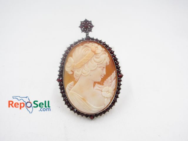 Lot 31-9251 - .925 Silver Garnet gemstone cameo - 15.85g total