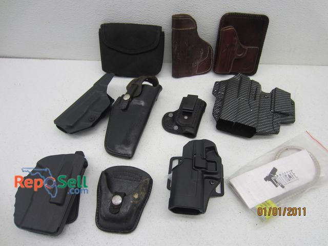 Lot 31-5210 - Lot of Holsters