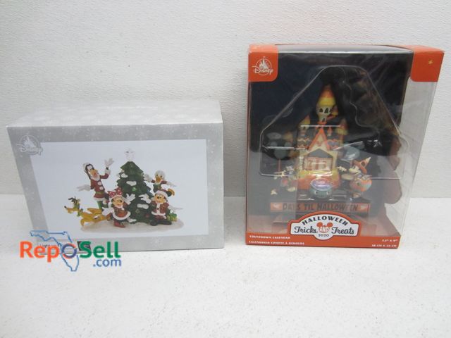 Lot 31-9188 - Disney Parks Light Up Figure &amp; Disney Halloween Countdown Calendar Figure