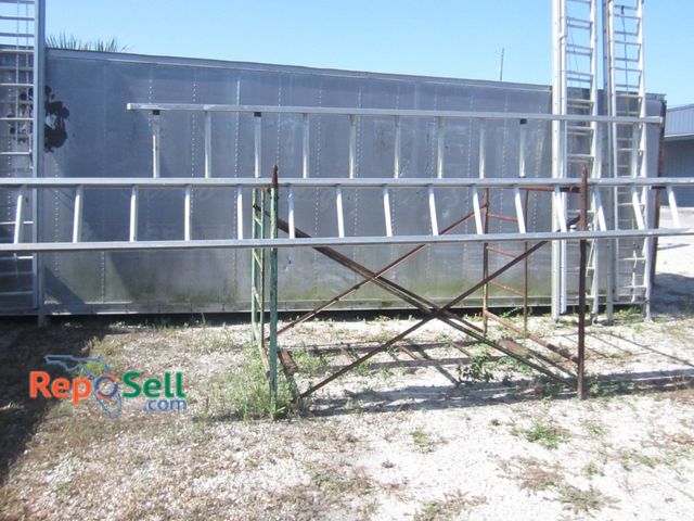Lot 31-1010 - (2) Aluminum ladders 12 ft and 16 ft