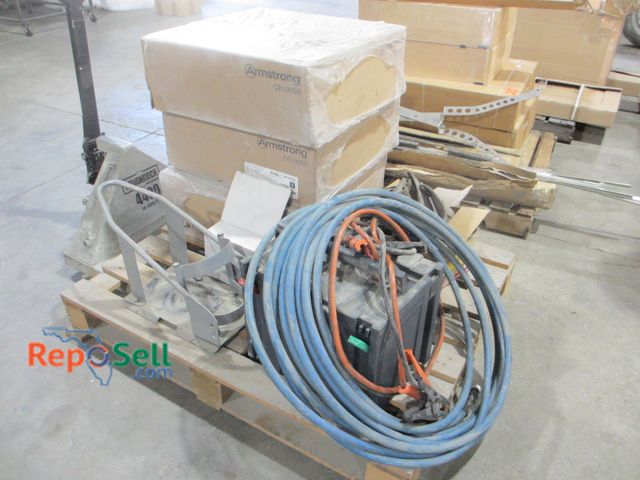Lot 31-8341 - Pallet Lot: Motorcycle Chock, Jumper Cables, (3) Boxes Ceiling Tile