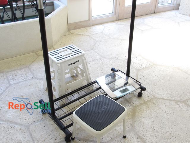 Lot 31-1474 - Metal/Plastic Rolling Clothes Rack With (2) Step Stool And Scale