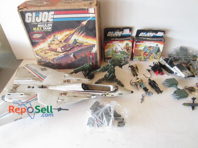 Lot 31-1112 - Vintage Lot of GI Joe Toys. Hauler Tank with Box, (2) Small Boxes have contents, Vehicles, Figures, ...