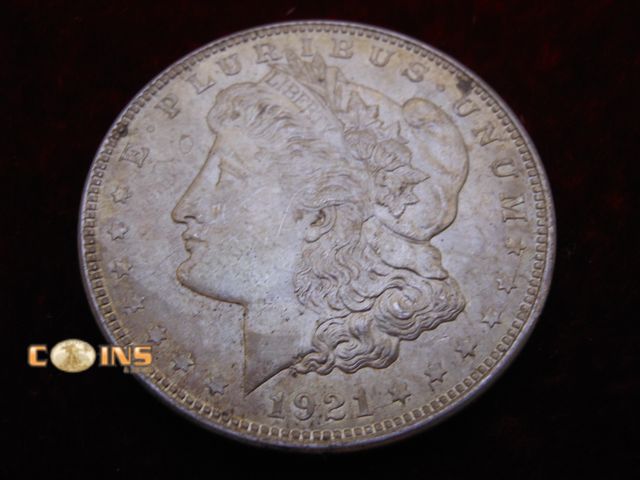 Lot 36-487290 - Better 1921 Morgan Silver Dollar.