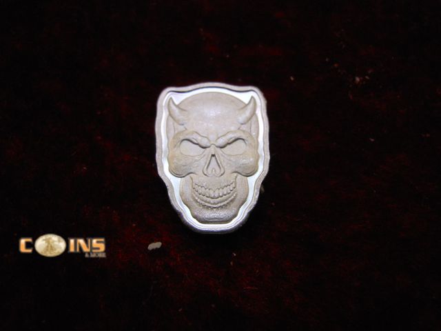 Lot 36-086672 - .999 Fine Silver One Gram Skull Round.