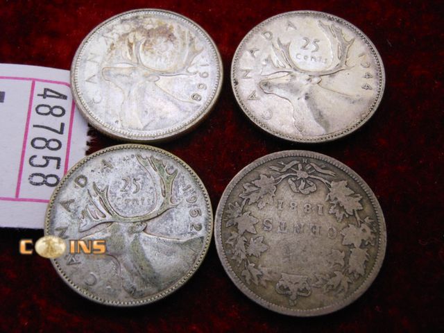 Lot 36-487858 - Lot of Four Silver Canadian Quarters.
