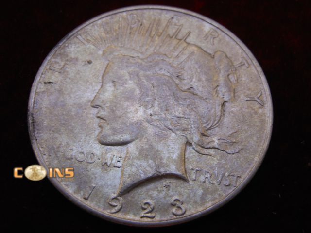 Lot 36-487298 - 1923-D Silver Peace Dollar.