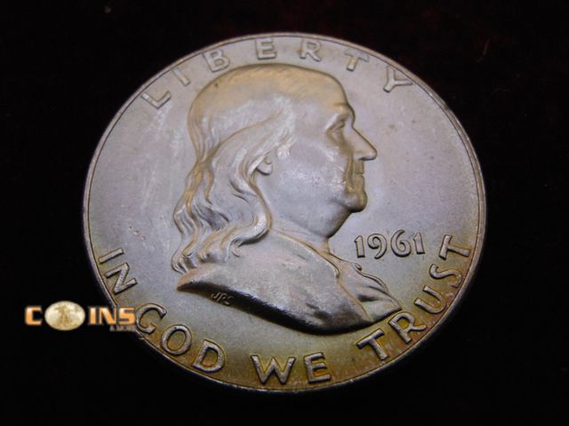 Lot 36-486503 - UNC/BU 1961-D Silver Franklin Half Dollar. Full Bell Lines Visible.