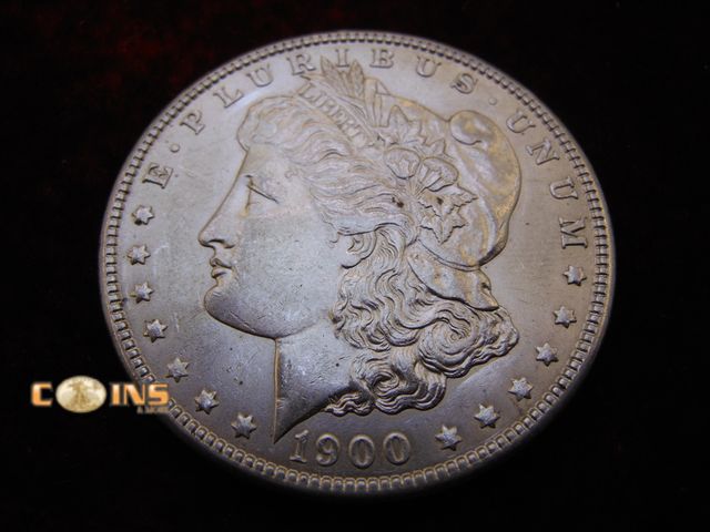 Lot 36-487747 - AU+ 1900 Morgan Silver Dollar, Fantastic Eye Appeal.