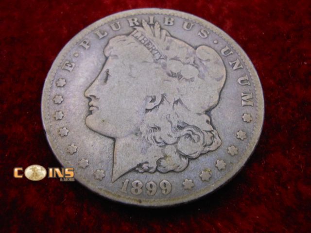 Lot 36-086716 - 1899-O Morgan Silver Dollar.
