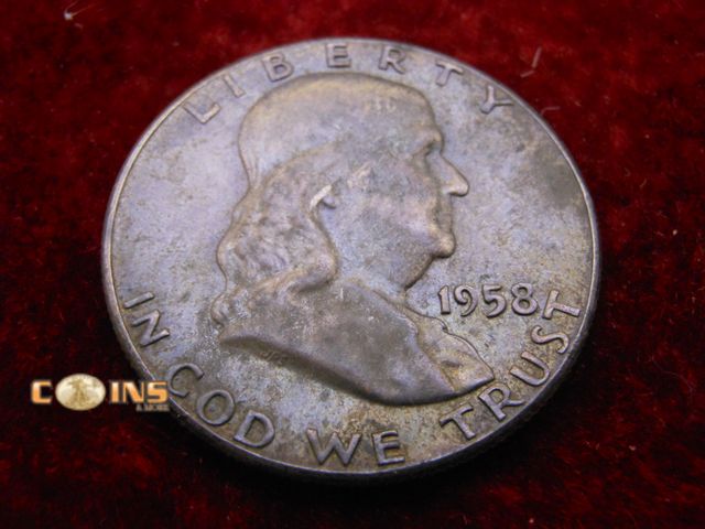 Lot 36-486499 - 1958 Silver Franklin Half Dollar. Bell Lines Visible.