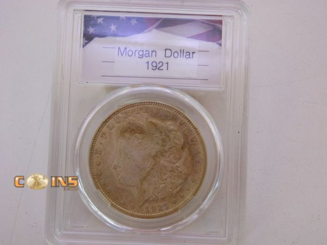 Lot 36-238288 - 1921 Morgan Silver Dollar in Hard Plastic Slab.
