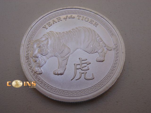 Lot 36-486555 - .999 Fine Silver One Troy Ounce Year of the Tiger Round.