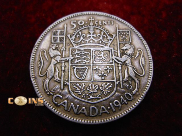 Lot 36-486624 - 1940 Canadian Silver Half Dollar.