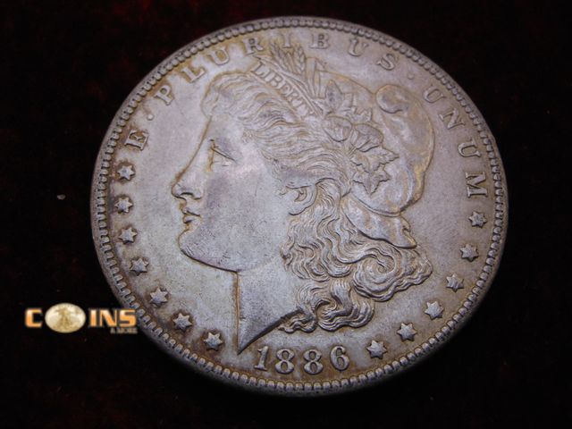 Lot 36-486376 - 1886-O Morgan Silver Dollar.