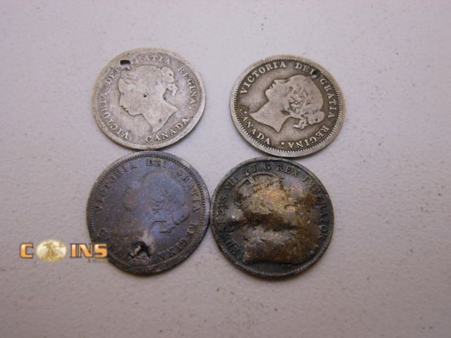 Lot 36-487879 - Lot of Four Silver Canadian Five Cent Pieces.