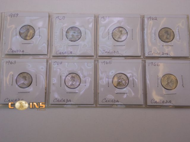 Lot 36-486640 - Lot of Eight Silver Canadian Dimes, Carded.