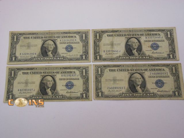 Lot 36-486615 - Lot of Four Blue Seal Silver Certificates.