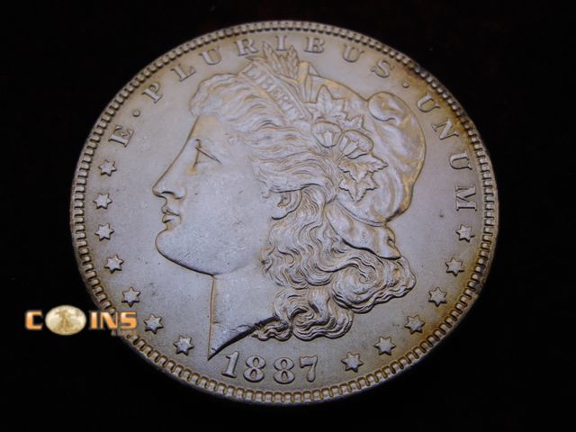 Lot 36-486367 - AU/BU 1887 Morgan Silver Dollar.  Full Breast Feathers.