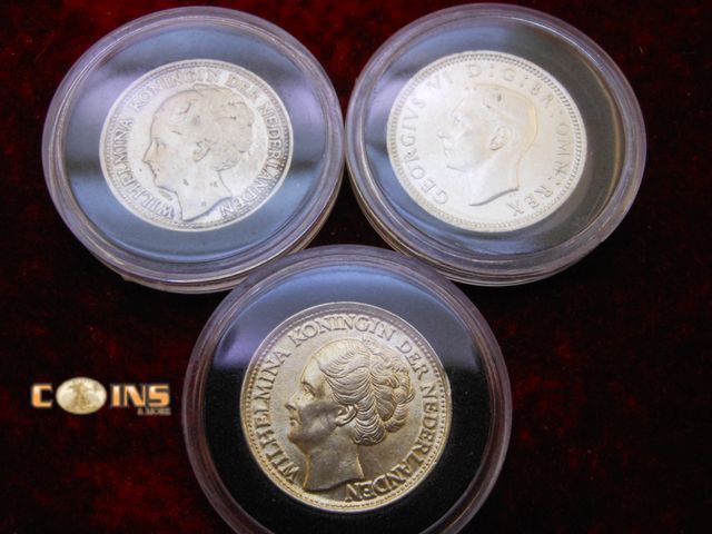 Lot 36-086744 - Lot of Three UNC/BU Silver Coins.  Come in Air Tights.