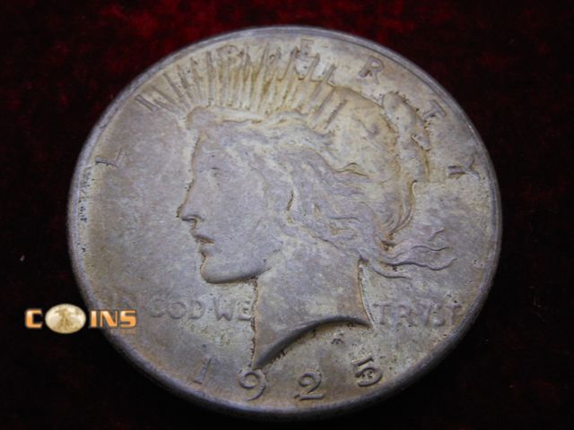 Lot 36-486412 - 1925 Silver Peace Dollar.