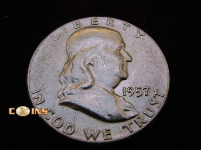 Lot 36-486496 - 1957 Silver Franklin Half Dollar. Bell Lines Visible.