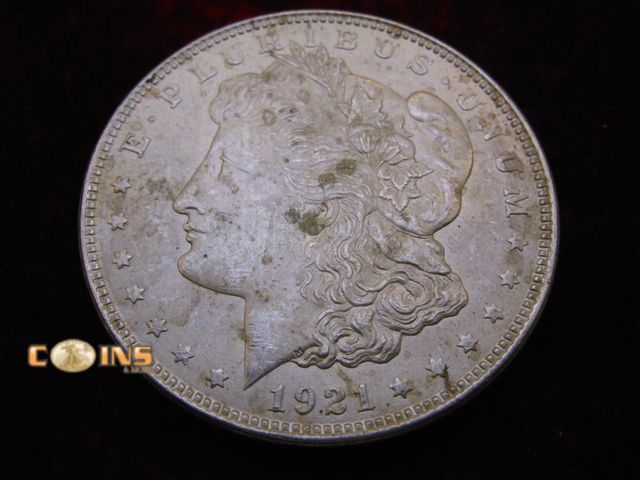 Lot 36-488367 - Better Condition 1921 Morgan Silver Dollar.