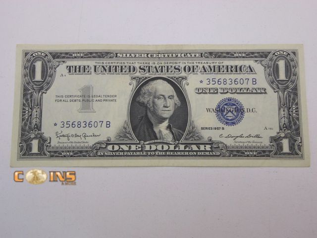 Lot 36-086728 - GEM CRISP 1957B Star Note Blue Seal $1 Silver Certificate.