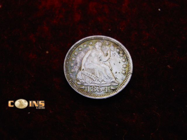 Lot 36-238230 - XF+ 1854 With Arrow Silver Seated Half Dime.