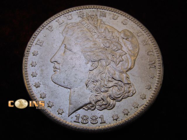 Lot 36-486361 - UNC/BU 1881-S DMPL Morgan Silver Dollar.  Full Breast Feathers.