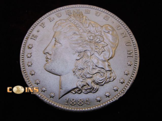 Lot 36-087119 - UNC/BU 1884-O Morgan Silver Dollar.