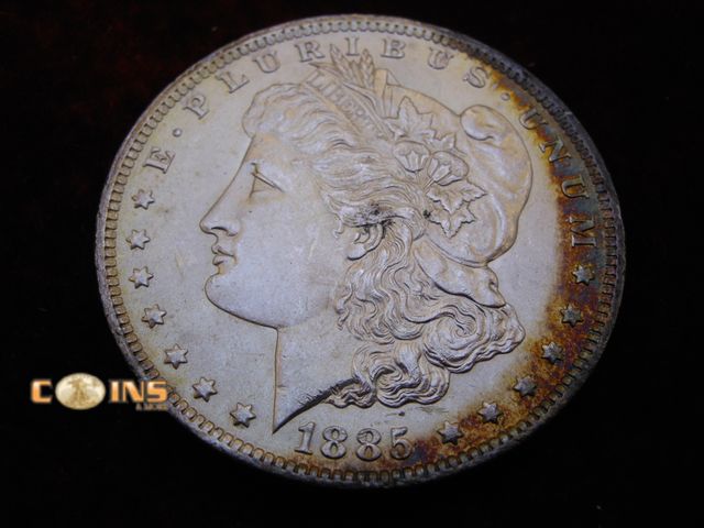 Lot 36-486212 - AU/BU 1885-O Toned Morgan Silver Dollar.